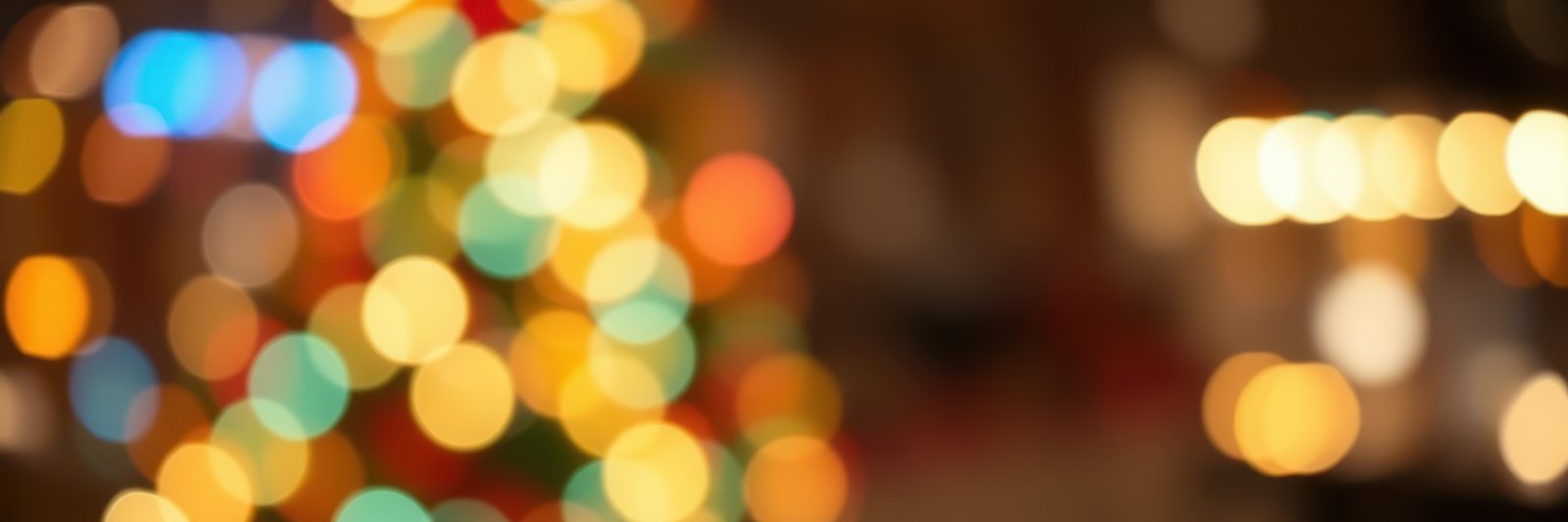 Colorful holiday lights create a festive atmosphere in a cozy indoor setting during the Christmas season